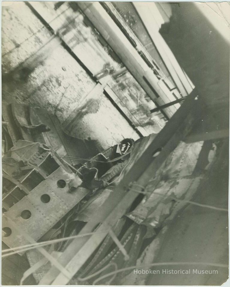 B+W photo of interior view of structural damage in an unidentified vessel at the Bethlehem Steel Shipyard, Hoboken Division, no picture number 1