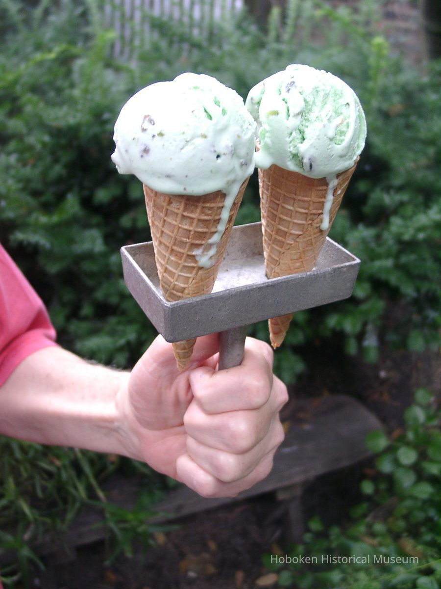 Digital images, 2, of an Italo Marchiony ice cream sandwich mold displayed as a cone holder, Hoboken, August 5, 2004. picture number 1