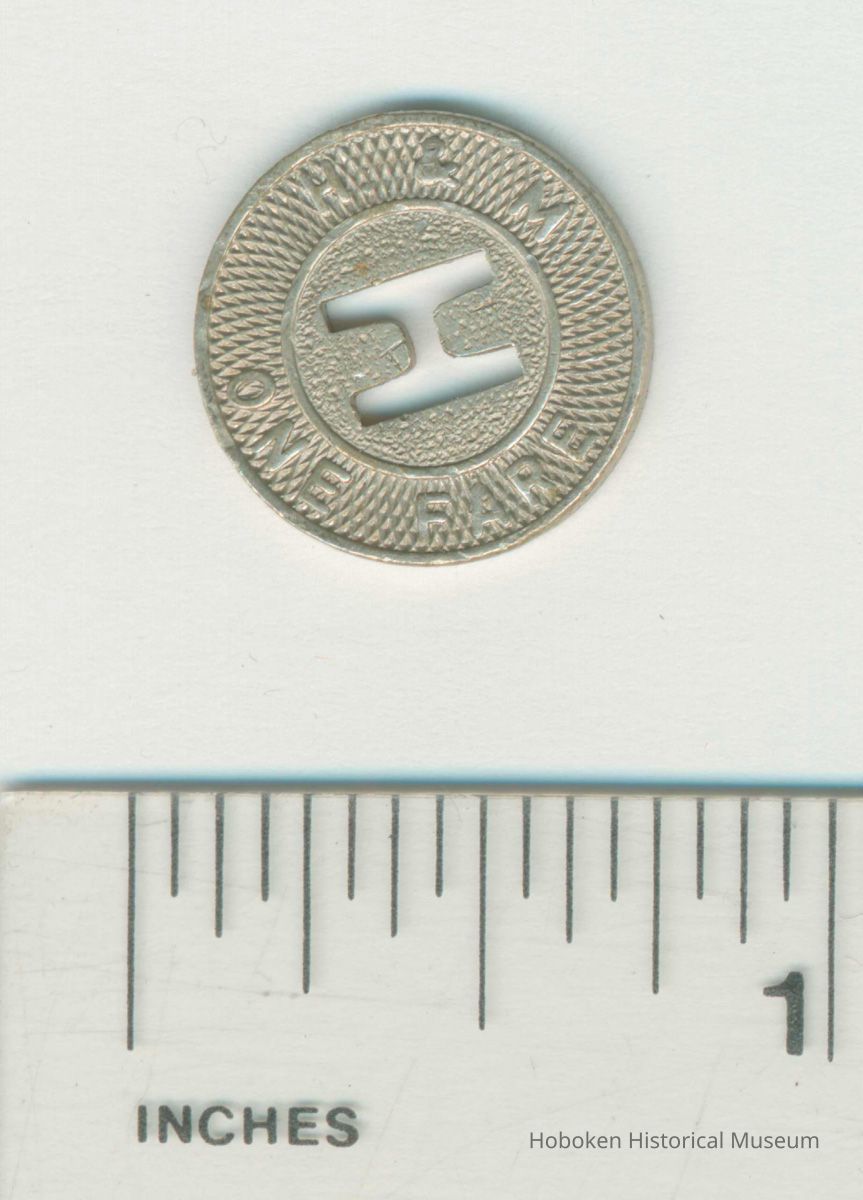 Metal coin token of the Hudson & Manhattan Rail Road, no date, ca. 1944. picture number 1