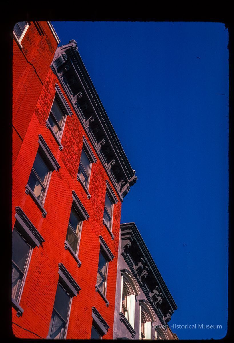 Color slide of eye-level view of cornices, brackets and façades on two buildings at an unidentified location picture number 1