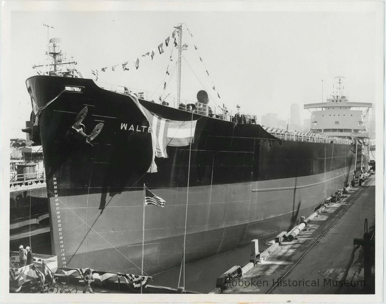 B+W photo of a bow view of the S.S. Walter Rice at christening in Todd Shipyards, Hoboken, Feb. 23, year not known. picture number 1