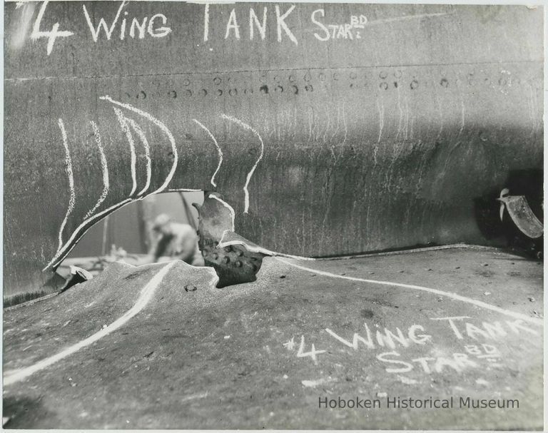 B+W photo of interior view of structural damage #4 wing tank starboard in an unidentified vessel at the Bethlehem Steel Shipyard, no date, ca. 1940. picture number 1