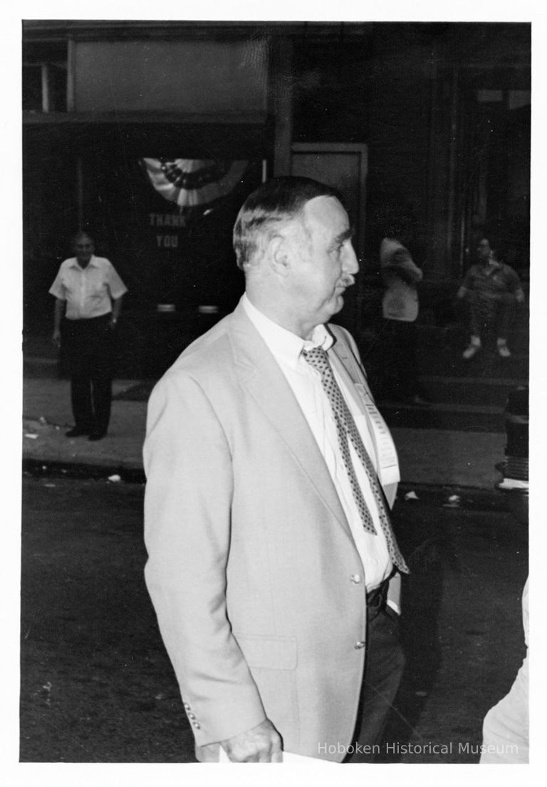 B+W photo of unidentified man with election badge on election night, Hoboken, [ June 11, 1985]. picture number 1