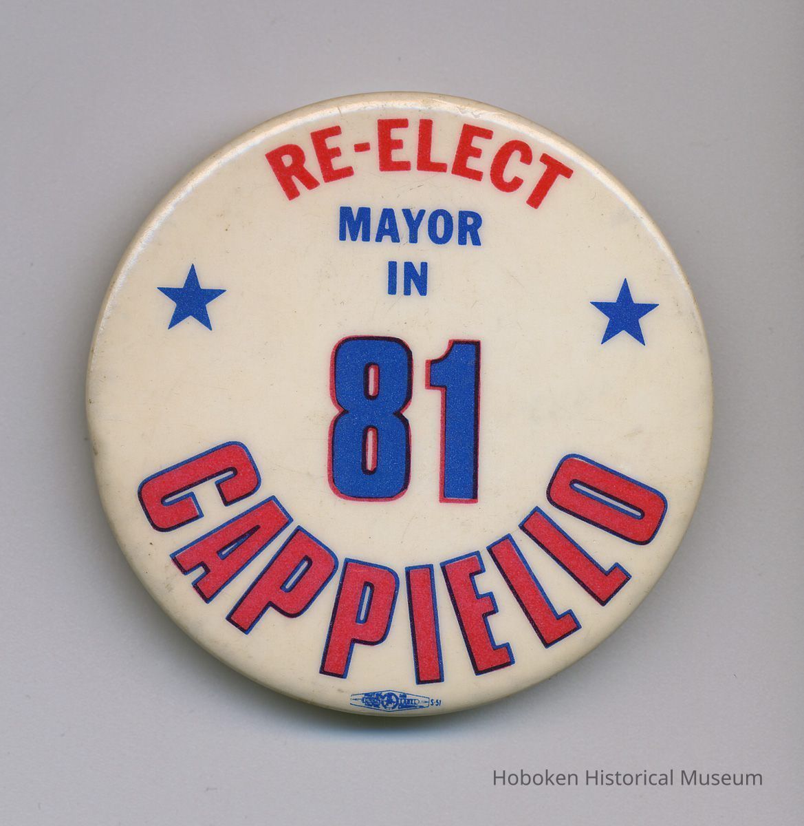 Political pin: Re-Elect Mayor in 81 Cappiello. (Hoboken, 1981.)