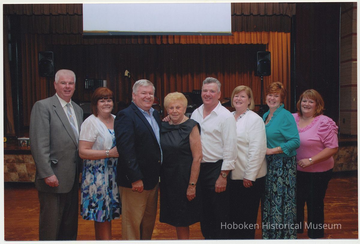Color photo of Cunning family group posed in church, Hoboken, n.d., ca. 2000s. picture number 1