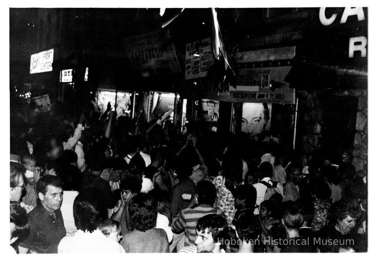 B+W photo of Tom Vezzetti supporters outside his campaign headquarters, 536 Washington St., on election night, Hoboken, [June 11, 1985]. picture number 1