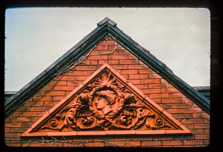 Color slide of close-up view of pediment on one of the buildings between 1210 and 1214 Bloomfield between 12th and 13th picture number 1