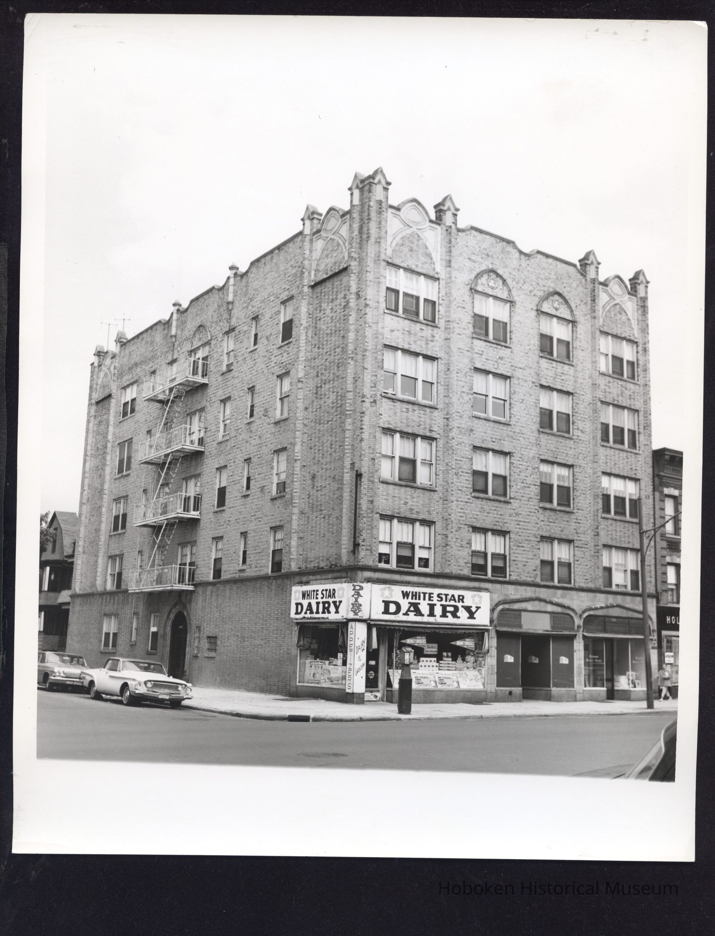 B&W photo of mixed-use apartment building at 77 Martin Luther King Drive, Jersey City. picture number 1