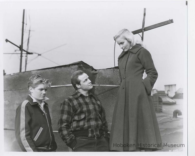 Tom Hanley, Marlon Brando, Eva Saint Marie