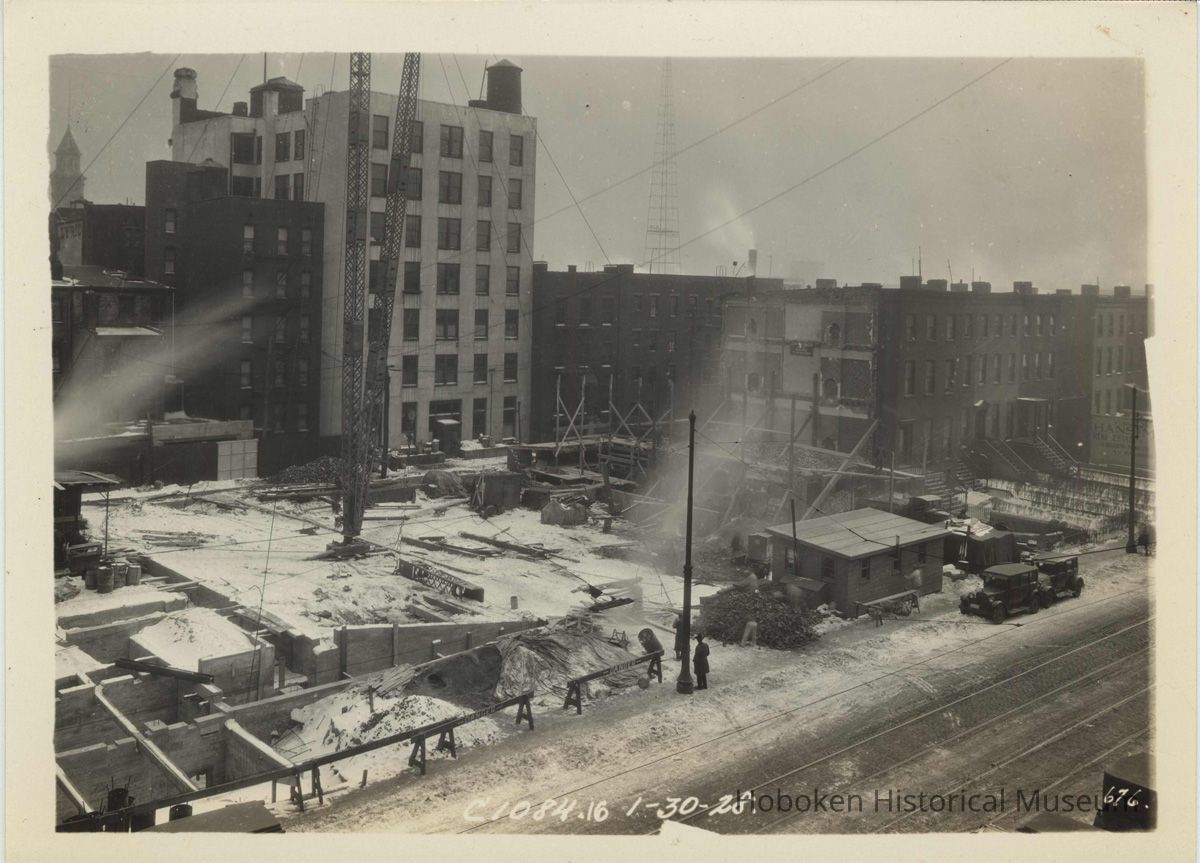 Sepia-tone photo of progress on foundation construction on the site for the Fabian Theatre, Newark & Washington Sts., Hoboken, Jan. 30, 1928. picture number 1