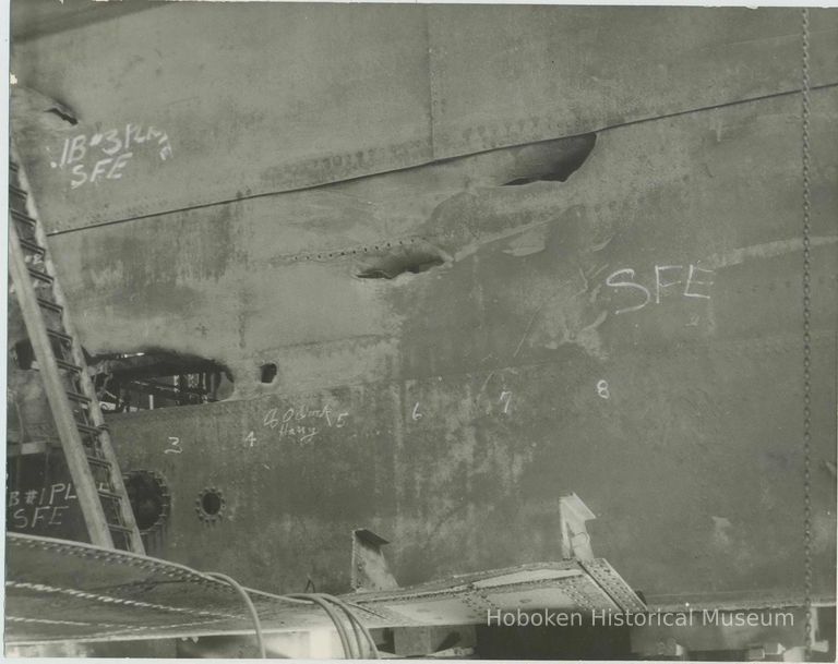 B+W photo of interior view of hull plate and structural repairs underway on unidentified vessel at the Bethlehem Steel Shipyard, Hoboken Division, no picture number 1