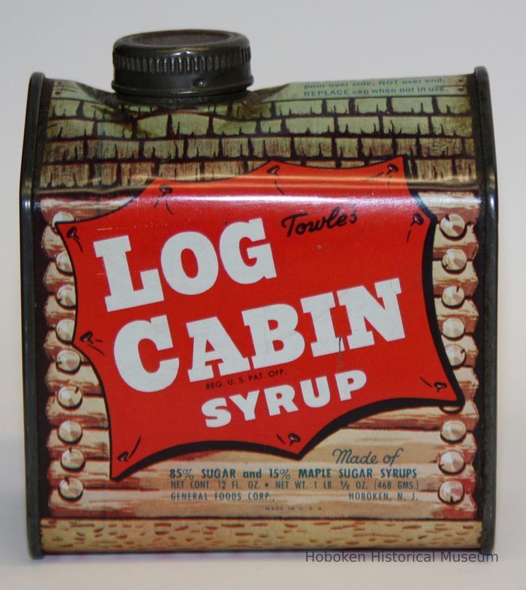 front view Log Cabin Syrup tin with Hoboken location