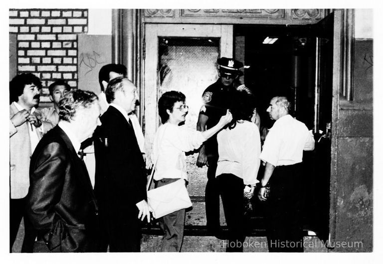 B+W photo of Mayor Steve Cappiello and others entering a building probably on election night, Hoboken, [ June 11, 1985]. picture number 1