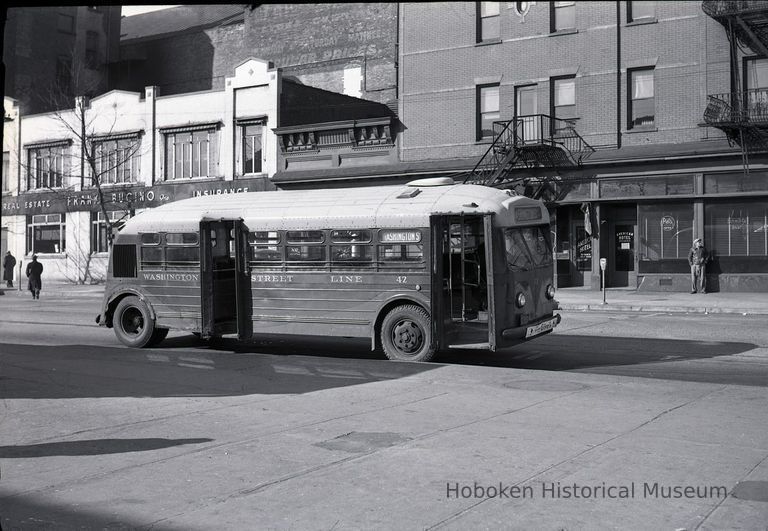 Washington Street Line bus no. 42 on Hudson Place west of River St.