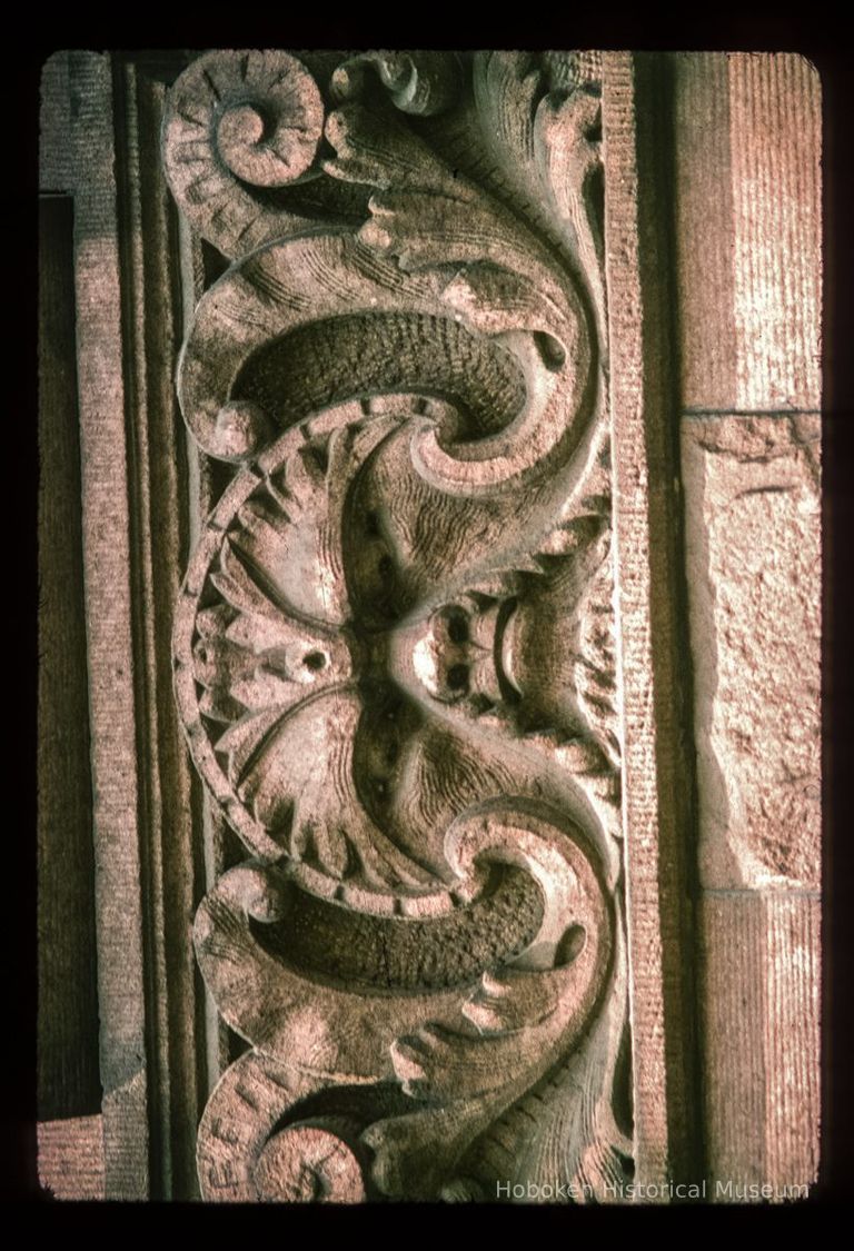 Color slide of close-up view of decorative tile on a building on Bloomfield between 10th and 11th picture number 1