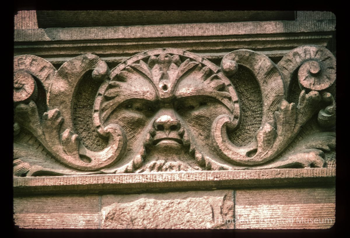 Color slide of close-up view of decorative tile on a building on Bloomfield between 10th and 11th picture number 1