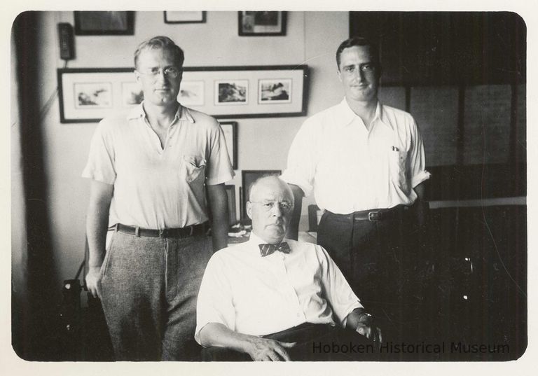 B+W photo of R. Neumann & Co., three men in an office, Hoboken, no date, ca. 1950-60. picture number 1