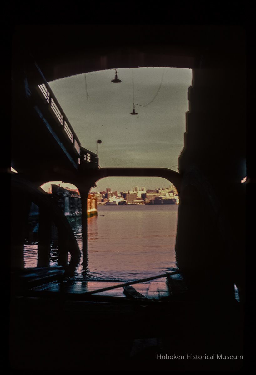 Color slide of eye-level view of the Hudson River and New York City looking E from inside the Lackawanna Terminal picture number 1