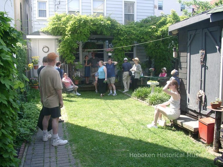 Digital color image of the gardens and people on the Secret Gardens Tour, Hoboken Historical Museum, Hoboken, June 9, 2002. picture number 1