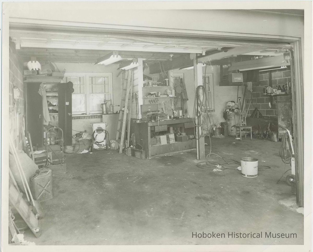 B+W photo of a garage interior believed to be in Hoboken, no date, ca. 1990. picture number 1