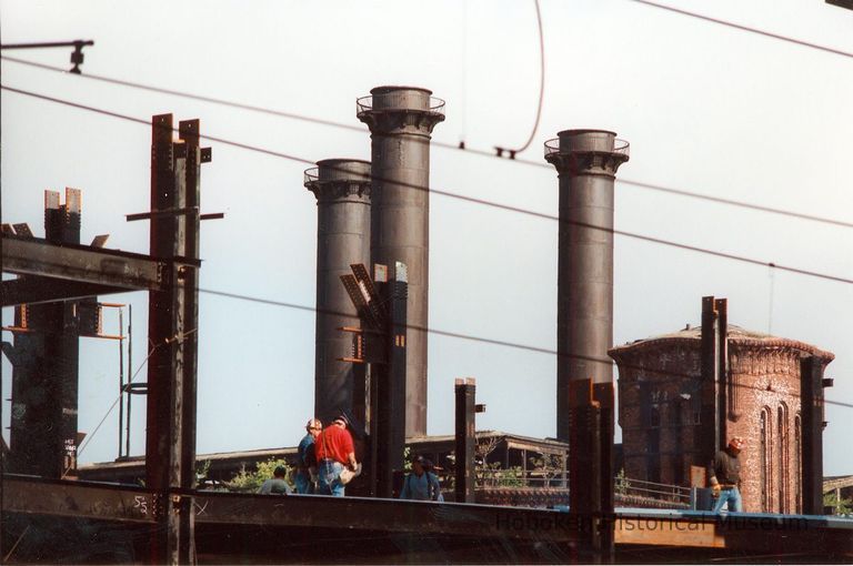 Digital image of color photo of the roof edge and smokestacks of the former Hudson & Manhattan Rail Road powerhouse, Jersey City, May, 2001. picture number 1