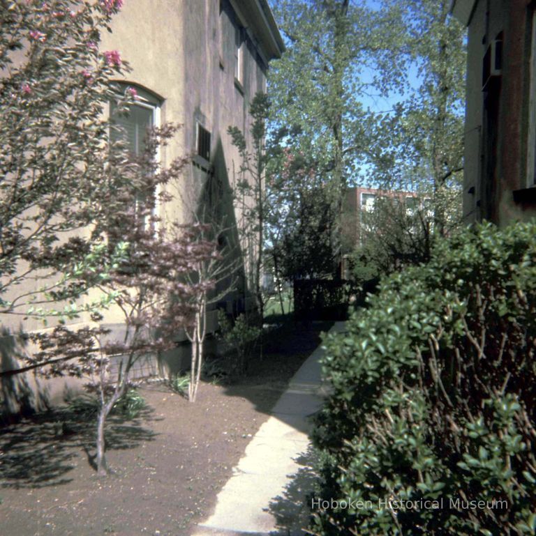 Color slide of the southern exterior and landscaped yard of 907 Castle Point Terrace, Hoboken, May, 1972. picture number 1