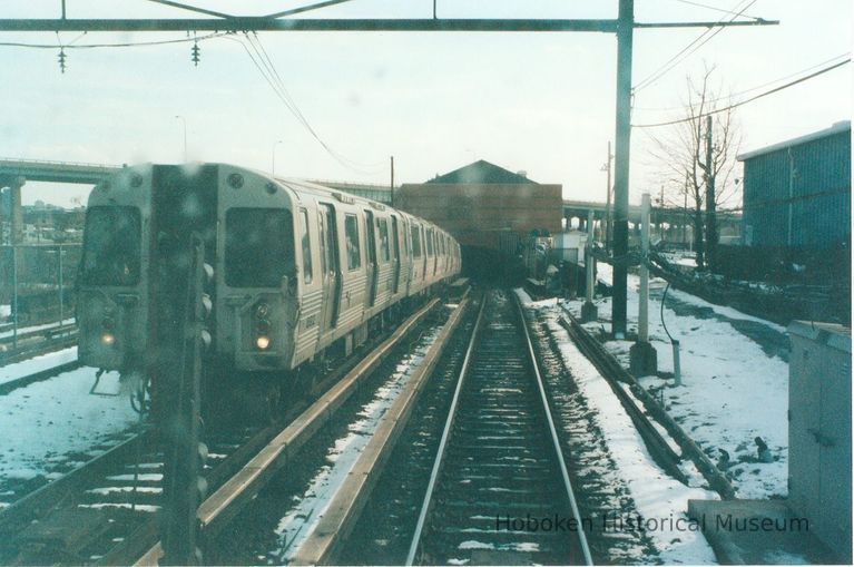 Digital image of color photo of a PATH train exiting a tunnel portal, Feb., 2001. picture number 1