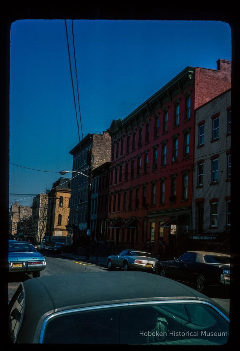 Color slide of eye-level view of row houses at 525 through 539 Park on the E side of the block between 5th and 6th looking N picture number 1