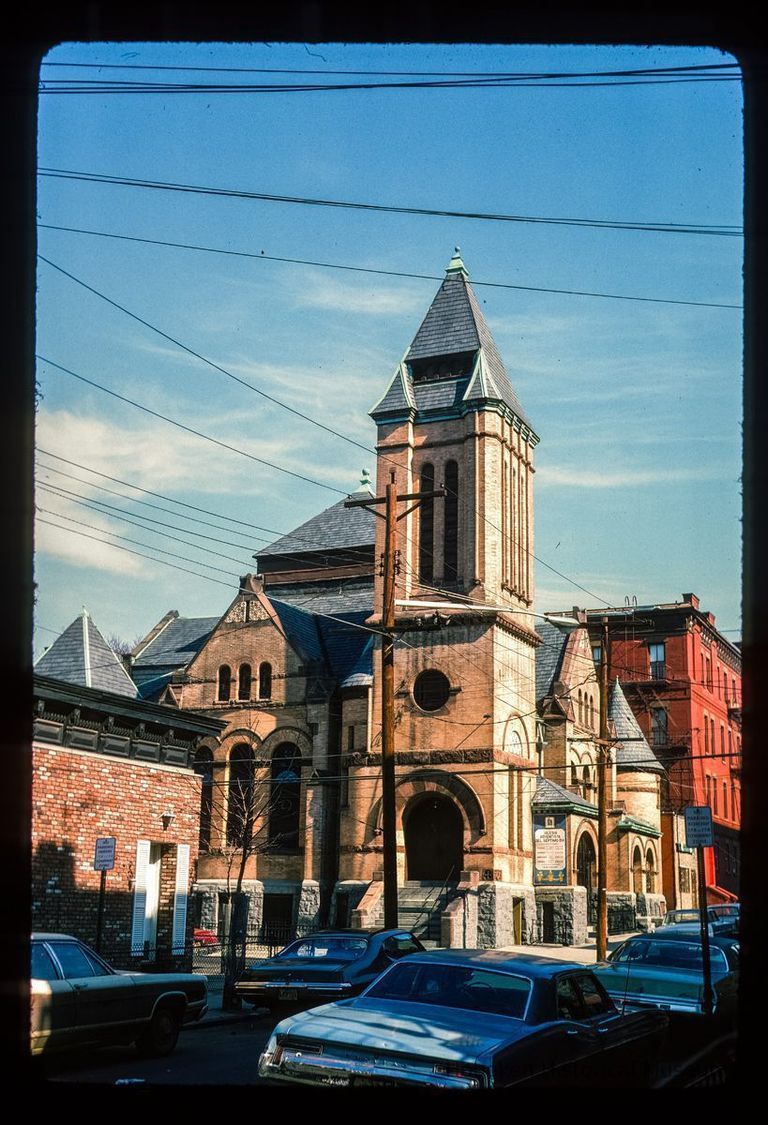 Color slide of eye-level view of front and side façades of the First Baptist Church at 901 Bloomfield on the NE corner of Bloomfield and 9th picture number 1