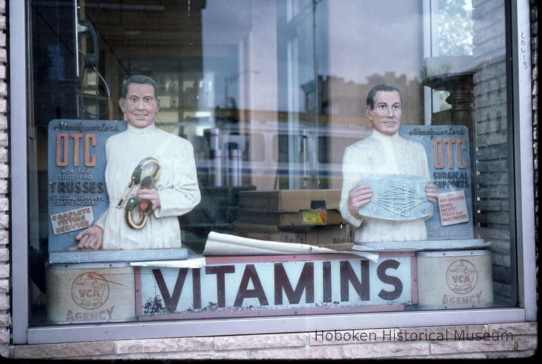 Color slide of a store window of the former Carollo's Pharmacy, 537 Washington St., Hoboken, May, 1983. picture number 1