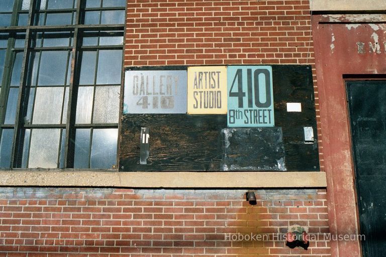 Color photo of 3 signs at 410 8th St.: Gallery 410, Artist Studio, 410 8th Street, Hoboken, Jan. 3 & 4, 2002. picture number 1