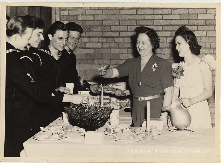 B+W photo of women serving punch to Coast Guard members at Hoboken Y.M.C.A. dance, Hoboken, n.d., ca. 1942-1945. picture number 1