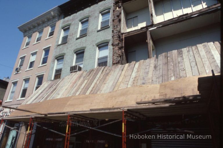 Color slide of facade replacement underway on the east side of the 400 block of Washington St., Hoboken, June, 1983. picture number 1