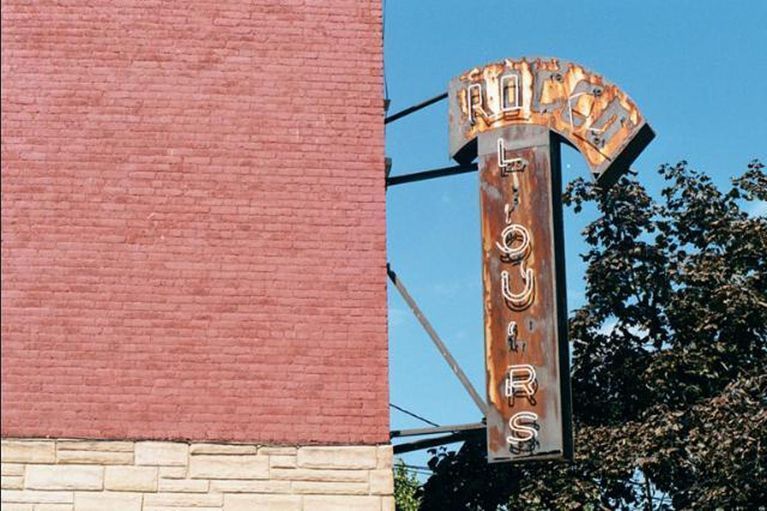 Color photo of the hanging sign for Rocco Liquors, 600 Clinton Street, Hoboken, Sept., 1-5, 2001. picture number 1