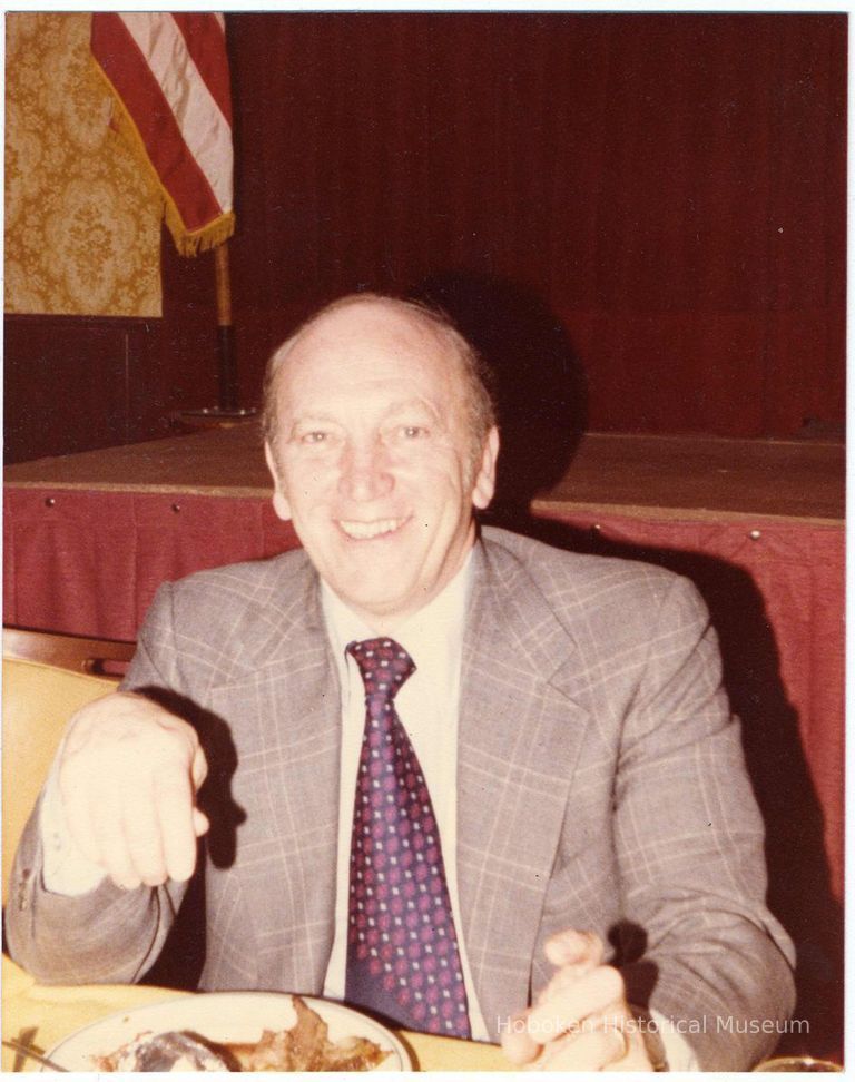 Digital image of color photo of Mayor Steve Cappiello seated at dinner or banquet, Hoboken?, no date, ca. 1980's. picture number 1