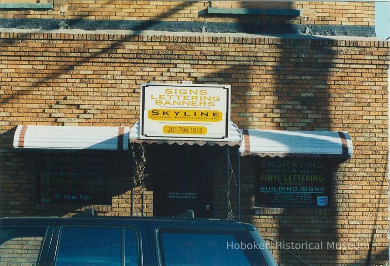 Color photo of sign for Skyline Graphic Management, 601 Adams Street, Hoboken, Jan. 3 & 4, 2002. picture number 1