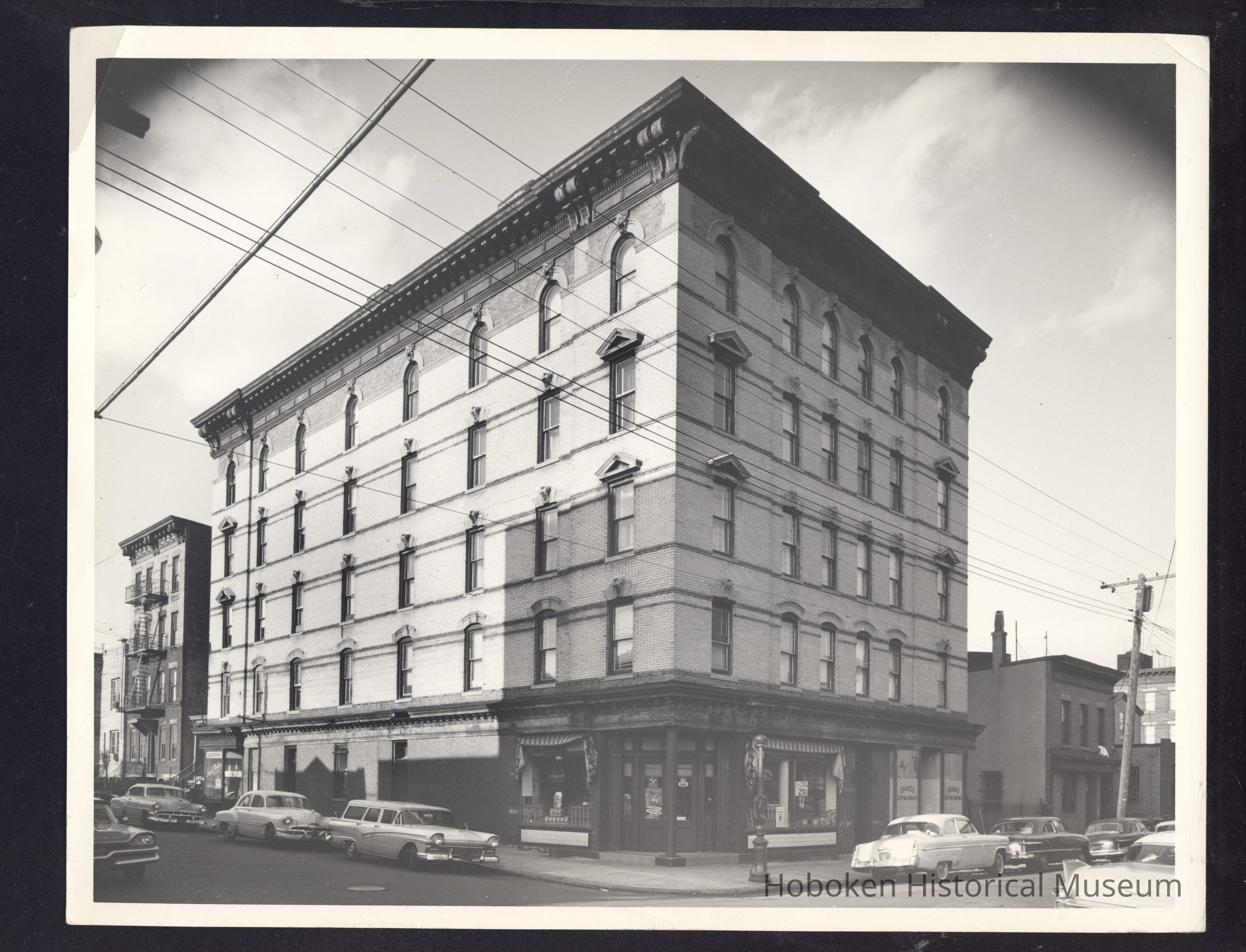 B&W photo of mixed-use apartment building at 2401 Central Avenue, Union City. picture number 1