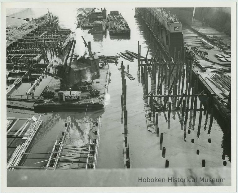 B+W photo of the construction of Pier 5 (formerly Pier 14) at the Bethlehem Steel Shipyard, Hoboken Division, January 30, 1957. picture number 1