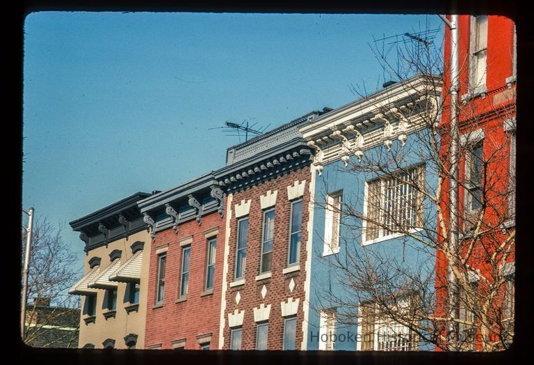 Color slide of close-up view of row house cornices at 629, 631, 633 and 635 Washington at the intersection of Washington & 7th looking N picture number 1