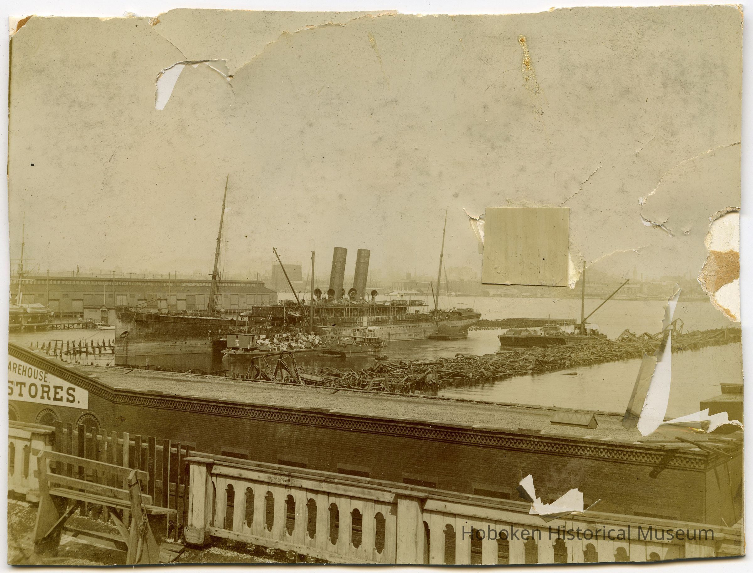 Sepia-tone photo of piers destroyed in June 1900 pier fire, Hoboken. picture number 1