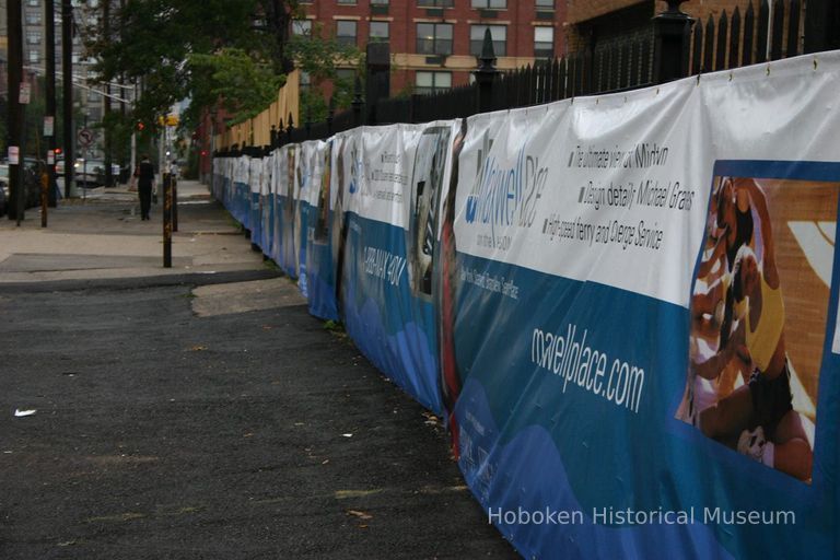 Digital color image of the Maxwell House Coffee plant site with printed vinyl fence sign banners, Hoboken, October 2004. picture number 1