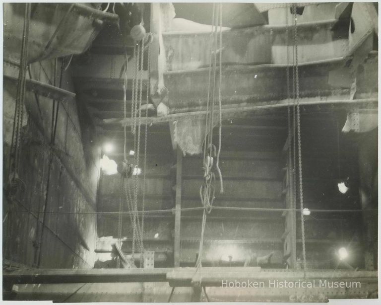 B+W photo of interior view of structural repairs underway on unidentified vessel at the Bethlehem Steel Shipyard, Hoboken Division, no picture number 1