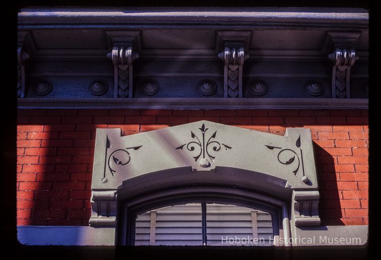 Color slide of close-up view of window head and cornice at 216 10th on the NE corner with Park picture number 1