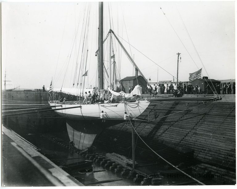 An American yacht being inspected in graving dock (America's Cup)