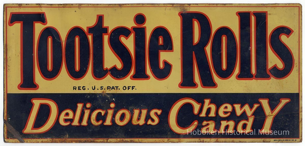Tootsie Rolls chromolithographed metal sign