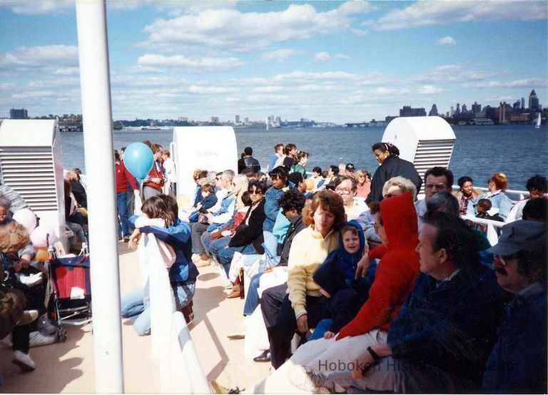 Color photo of the passengers on Hudson River ferry looking north, Hoboken 1989. picture number 1