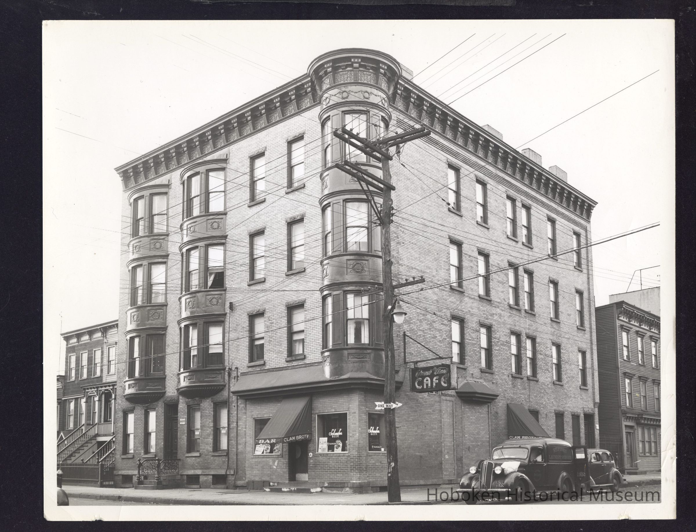 B&W photo of mixed-use apartment building at 193-195 Ogden Avenue, Jersey City. picture number 1