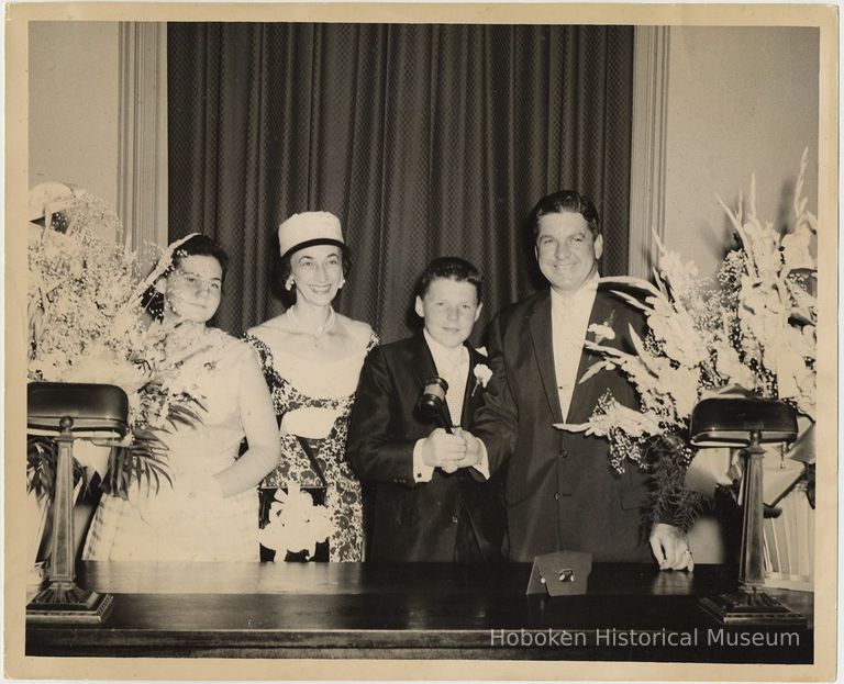 B+W photo of Mayor John J. Grogan with family in Mayor's Office, City Hall, Hoboken, no date, ca. 1957-1961. picture number 1