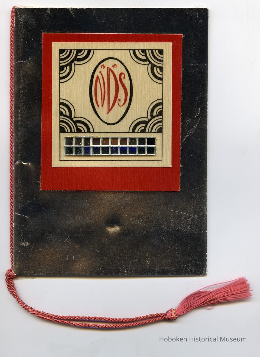 front cover, full cord and tassel