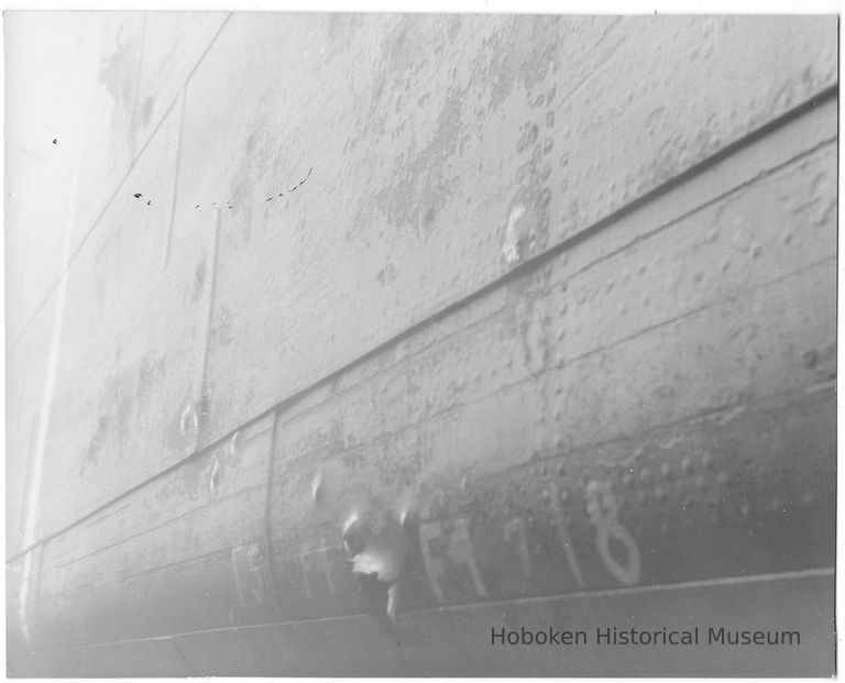 B+W photo of a detail view of hull damage to an unidentified vessel at the Bethlehem Steel Shipyard, Hoboken Division, no date, ca 1940. picture number 1